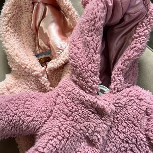 2 “coats” one short First Impressions 0-3 months.  One 7 for all mankind 3/6